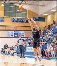  ?? Tim Godbee ?? Calhoun senior guard Caden Schild releases a three-point shot Tuesday night against Cass.