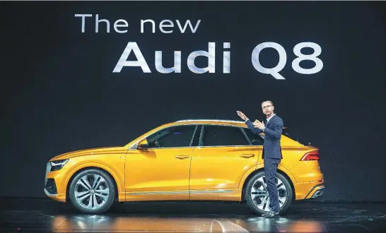  ?? PHOTOS PROVIDED TO CHINA DAILY ?? Audi’s flagship Q8 SUV makes its global premiere in Shenzhen, Guangdong province on June 5.