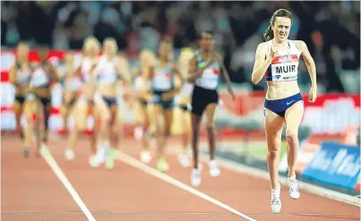  ?? Picture: Getty. ?? Laura Muir striding out to win the 1,500m and set a UK record at the Muller Anniversar­y Games in London last night.