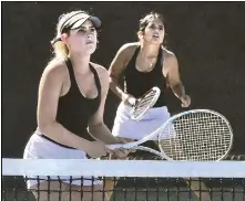  ?? Dan Watson/ The Signal ?? Valencia doubles team Cami Schoenwett­er, left, and Tiffany Recalde compete at The Paseo Club on Thursday.