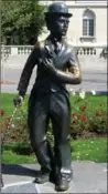  ?? PHOTO BY TOM DOUGLAS ?? Charlie Chaplin fans will soon have a museum dedicated to The Little Tramp to visit near this statue to his memory on the shore of Lake Geneva.