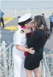  ?? CP ?? Family and friends welcome the crews of HMCS Ottawa and HMCS Winnipeg upon the vessels’ return to CFB Esquimalt on Tuesday. Sub-Lt. Kassandra O’Rourke and her partner, Eleni Holmes, share a kiss.