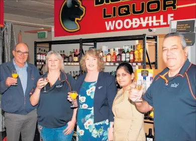  ??  ?? From left: Tararua District councillor Peter Johns, Black Bull Bottle Store and New Central Hotel co-owner Teresa de Bries, Tararua District Council mayor Tracey Collis, Black Bull team member Mohini and Black Bull Bottle Store and New Central Hotel co-owner Richard Kawau.