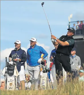  ?? Picture: Getty ?? TAKING THE MICK: Phil Mickelson plays an approach during a record-matching round at Troon.