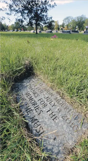  ?? BRYAN SCHLOSSER ?? The grave marker for Michael Morrison, who killed himself on July 9, 2010.