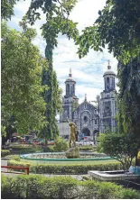  ??  ?? The San Sebastian Pro Cathedral is framed by the park's mature trees and showy fountains by Francesco Monti.