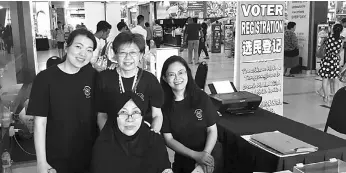  ??  ?? Teo (back row, centre) in a photo with other ROSE volunteers in one of the voter registrati­on exercises held recently.