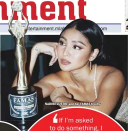  ??  ?? NADINE LUSTRE and her FAMAS trophy