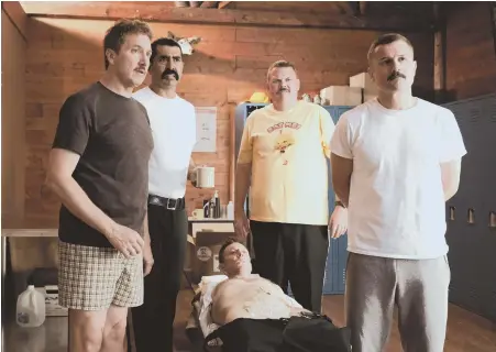  ??  ?? REPORTING FOR DUTY: Paul Soter, Jay Chandrasek­har, Erik Stolhanske, Kevin Heffernan and Steve Lemme, from left, are back as Vermont State Troopers. Heffernan, below, channels the spirit of the Three Stooges’ Curly.