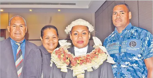  ?? Picture: JONACANI LALAKOBAU ?? Fane Kasa, with garland, is pictured with her family members from left, dad, Apiliasi Kasa, mum, Ana Kasa and husband Fabiano
Rogovakala­li after the swearing-in ceremony at the Grand Pacific Hotel.