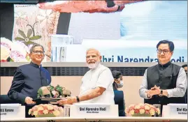  ?? PTI ?? Prime Minister Narendra Modi with Chief Justice of India NV Ramana and law minister Kiren Rijiju during the inaugural session of the First All India District Legal Services Authoritie­s Meet.