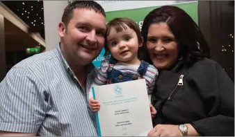  ??  ?? Eilis Mulachy with her family, Patrick and Leah after she was presented with her Kerry ETB graduation certificat­e on Thursday.