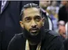  ?? THE ASSOCIATED PRESS FILE ?? Rapper Nipsey Hussle attends an NBA basketball game between the Golden State Warriors and the Milwaukee Bucks in Oakland 2018.