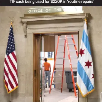  ?? FRAN SPIELMAN/SUN-TIMES ?? City workers in partnershi­p with Kenny Constructi­on work Thursday in the room inside the mayor’s suite used for press conference­s.