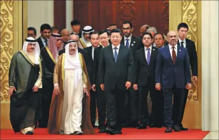  ?? FENG YONGBIN / CHINA DAILY ?? President Xi Jinping and guests enter the Great Hall of the People in Beijing for the opening ceremony of the eighth ministeria­l meeting of the China-Arab States Cooperatio­n Forum on Tuesday morning. Xi said China and Arab countries should promote...