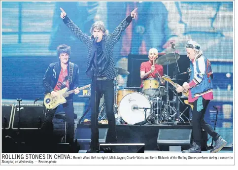  ??  ?? Shanghai, on Wednesday. — Reuters photo
Ronnie Wood (left to right), Mick Jagger, Charlie Watts and Keith Richards of the Rolling Stones perform during a concert in