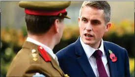  ??  ?? ACTION: Gavin Williamson talking to a senior officer