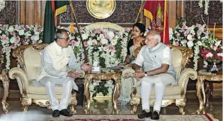  ??  ?? COURTESY CALL: Bangladesh President Abdul Hamid, left, talks with visiting Indian Prime Minister Narendra Modi at presidenti­al residence Bangabhaba­n in Dhaka on Sunday.
