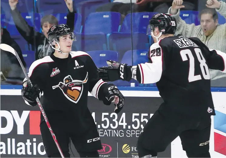  ?? — GETTY IMAGES FILES ?? The Giants hope top scorer Ty Ronning, left, is back in the lineup Friday, but they will have to wait at least another week for defenceman Darian Skeoch.