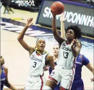  ?? David Butler II / USA TODAY ?? UConn’s Christyn Williams (13) shoots against UMass Lowell on Saturday in Storrs.