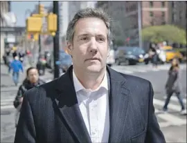  ?? Seth Wenig Associated Press ?? THE FBI raided the offices of attorney Michael Cohen, reportedly for informatio­n about his payments to women who alleged affairs with Donald Trump.