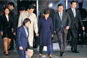  ?? KIM HONG-JI / REUTERS ?? South Korea’s ousted leader Park Geun-hye leaves the prosecutor’s offices in Seoul on Wednesday morning.