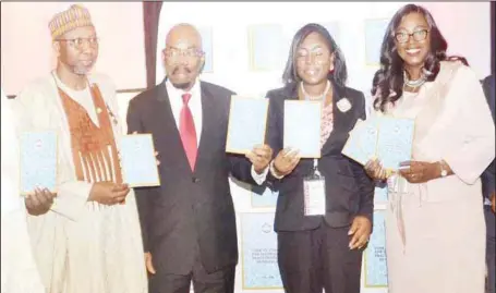  ??  ?? L-R: The Commission­er for Insurance, Muhammed Kari; Founder/Chairman, Zenith Group, Mr. Jim Ovia; Guest Speaker, Mrs. Temitope Akin-Fadeyi and, Chairman Insurance Industry Consultati­ve Council, Mrs Funmi Babington-Ashaye, during the National Insurance...