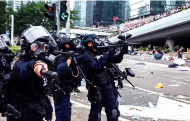  ?? AFP / ISAAC LAWRENCE ?? HONG Kong witnessed the worst political violence in a generation as police fought largely young demonstrat­ors opposed to a controvers­ial extraditio­n bill.