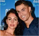  ?? ?? Walking away: Ronaldo with long-term partner Georgina