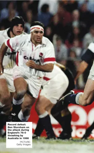  ?? PICTURE: Getty Images ?? Record defeat: Ben Sturnham on the attack during England’s 76-0 thrashing by Australia in 1998