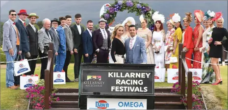  ?? Photo By Domnick Walsh ?? RIGHT: Thalia Heffernan and Aidan O’Mahony pictured with the best dressed finalists at a Killarney Races on Ladies Day .