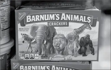  ?? ASSOCIATED PRESS ?? THIS MONDAY PHOTO shows a box of Nabisco Barnum’s Animals crackers on the shelf of a local grocery store in Des Moines, Iowa. Mondelez Internatio­nal says it has redesigned the packaging of its Barnum’s Animals crackers after relenting to pressure from People for the Ethical Treatment of Animals.