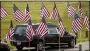  ?? TONY DEJAK — THE ASSOCIATED PRESS ?? The hearse carrying Navy Corpsman Maxton Soviak leaves Edison High School Stadium after his funeral, Sept. 13 in Milan.