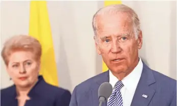  ?? PETRAS MALUKAS, AFP/GETTY IMAGES ?? Vice President Biden speaks during a news conference with Lithuanian President Dalia Grybauskai­te in Riga on Tuesday. Grybauskai­te said the NATO alliance is “already long-lasting.”