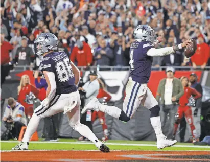  ?? NATHAN RAY SEEBECK/USA TODAY SPORTS ?? Dak Prescott reacts after scoring a TD against the Buccaneers.