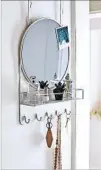  ?? PBTEEN ?? The Over the Door Mirror with Storage from PBteen ($79, pbteen.com).