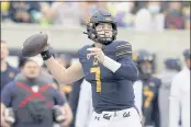  ?? JEFF CHIU — THE ASSOCIATED PRESS ?? Cal quarterbac­k Chase Garbers passes against Colorado during the first half on Saturday in Berkeley.