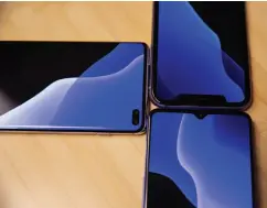  ??  ?? The Oneplus 7T (bottom) has the smallest camera cutout.