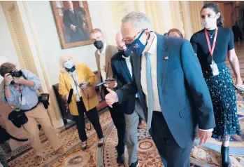  ?? T.J. KIRKPATRIC­K/THE NEW YORK TIMES ?? Mitch McConnell is seen Thursday, hours ahead of a Senate vote to raise the debt ceiling.