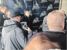  ?? BILL SAWCHUK
THE ST. CATHARINES STANDARD ?? Ryan Harrison, co-owner of the Welland Jackfish, is surrounded by fans and well-wishers at the team’s introducto­ry news conference Saturday.