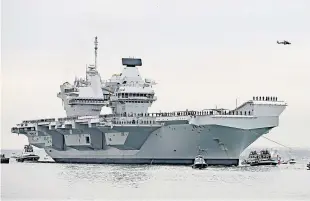  ?? Picture: PA. ?? HMS Queen Elizabeth, the UK’s newest aircraft carrier, which as a result of an issue with a shaft seal. is leaking