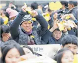  ?? Photo / AP ?? South Koreans against the 2015 deal rip up signs reading “Reconcilia­tion and Healing Foundation” and “2015 agreement between South Korea and Japan”, during a weekly protest near the Japanese Embassy in Seoul.