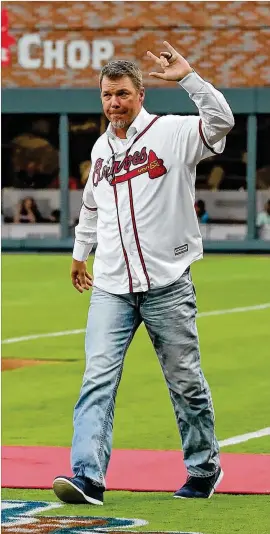  ?? CURTIS COMPTON / CCOMPTON@AJC.COM ?? Chipper Jones, taking the field for the Braves’ home opener against the Padres last April, now keeps busy with fatherhood and filming his hunting show on Sportsman Channel, “Major League Bowhunter,” among other pursuits.