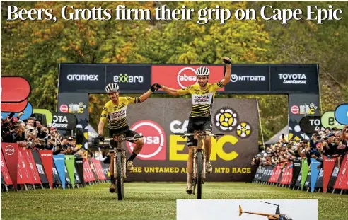  ?? Epic/Epic Series/Nick Muzik Pictures: Absa Cape ?? Matt Beers and Howard Grotts of Toyota Specialize­d 91 during Stage 6 of the 2024 Absa Cape Epic Mountain Bike stage race in Stellenbos­ch yesterday.