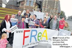  ??  ?? Kind Friends of the Refugees Ayrshire promote their fundraisin­g efforts
070915supp­ort_ 1