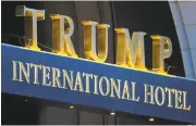  ?? PAUL J. RICHARDS/AGENCE FRANCE-PRESSE VIA GETTY IMAGES ?? Critics of President Donald Trump contend that foreign government­s and dignitarie­s’ use of the Trump hotel in D.C. violate the emoluments clause in the Constituti­on.