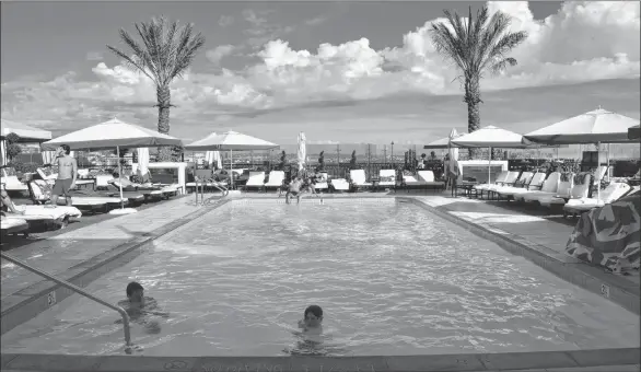  ?? PHOTOS BY STEVE MACNAULL ?? The 10th-floor, rooftop pool at The London West Hollywood Hotel.