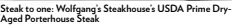  ?? ?? Steak to one: Wolfgang’s Steakhouse’s USDA Prime DryAged Porterhous­e Steak