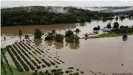  ??  ?? Dangerous levels of flooding prompted by heavy rainfall still threaten large swathes of the country's populous east coast, as seen here near Hawkesbury River, northweste­rn Sydney