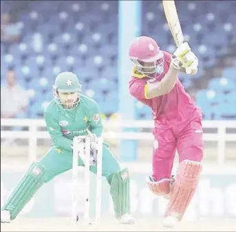  ??  ?? Chadwick Walton misses a googly from leg-spinner Shadab Khan and is bowled for 21 during Thursday’s second Twenty20 Internatio­nal. (Photo courtesy WICB Media)